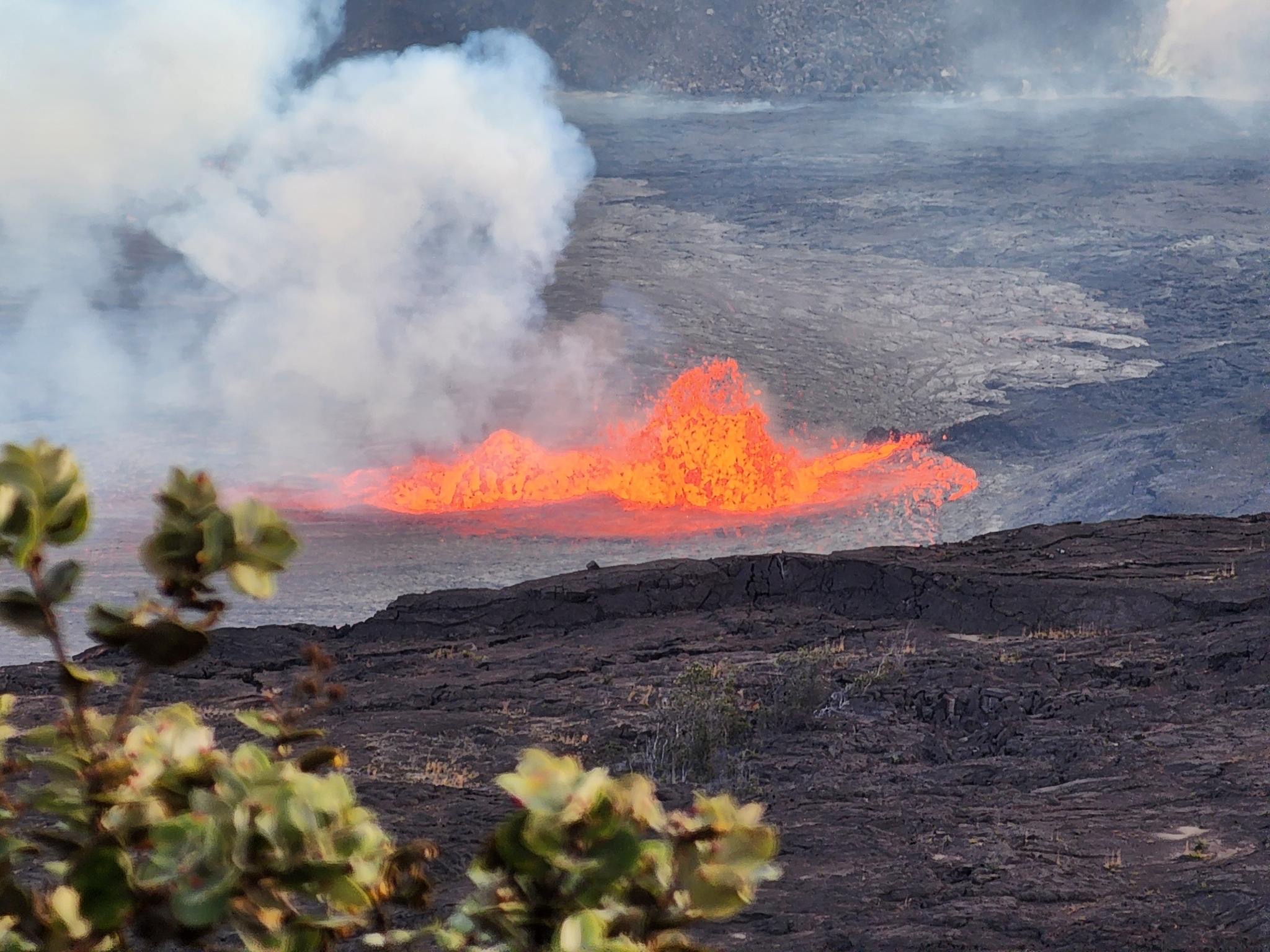 Glowing lava at Halemaʻumaʻu crater after dusk