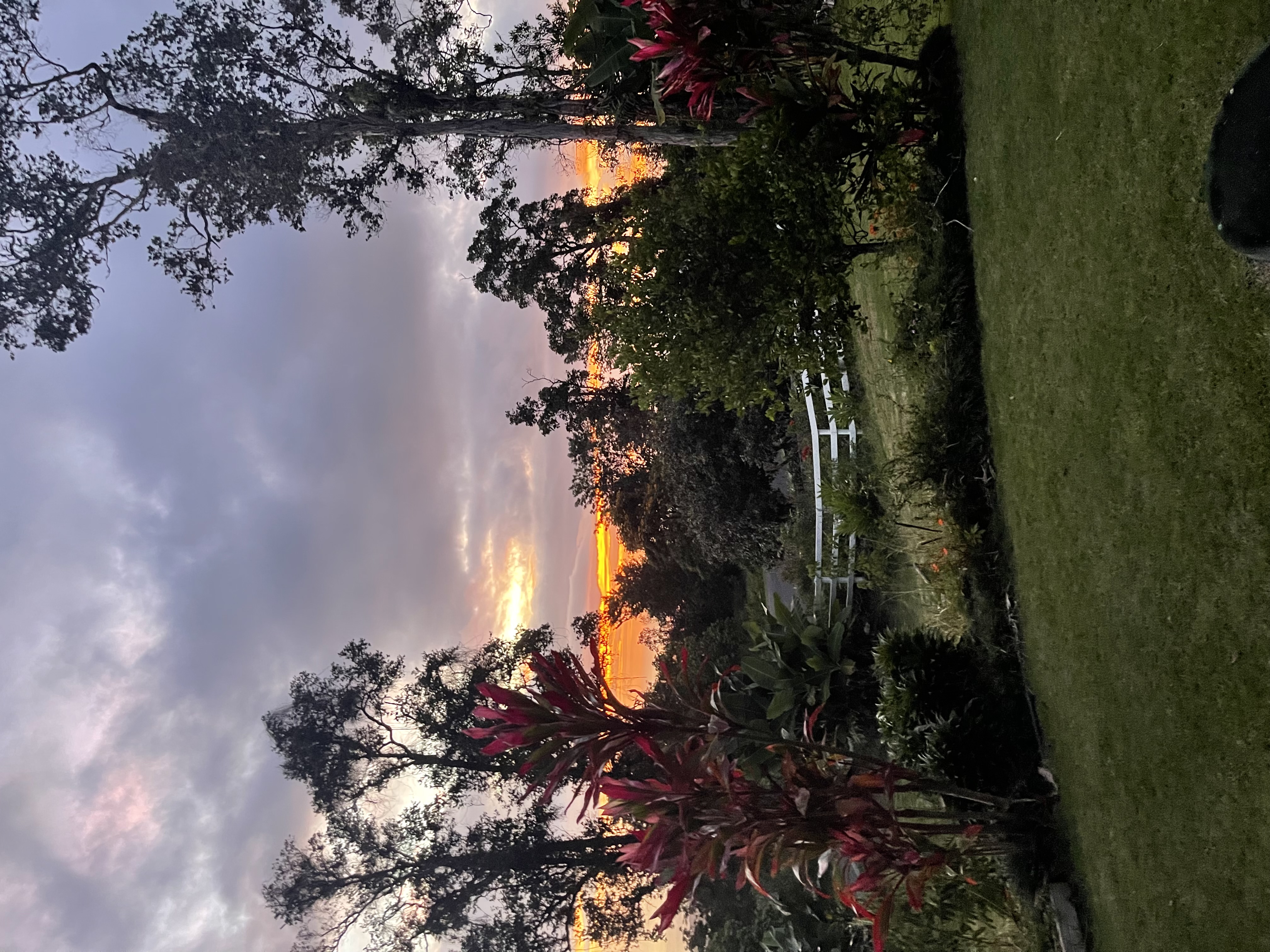 Sunset over a Kona sea cliff